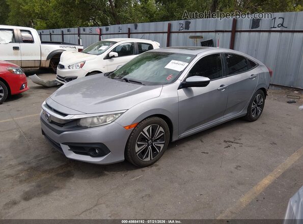 2HGFC1F38GH640649 2016 HONDA CIVIC Silver Vista tres cuartos delantera izquierda