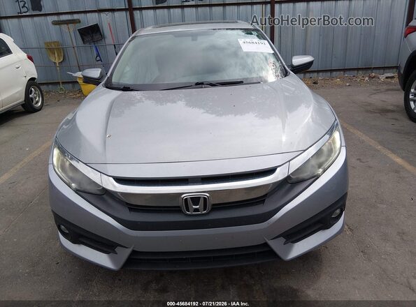 2HGFC1F38GH640649 2016 HONDA CIVIC Silver Vista interior trasera