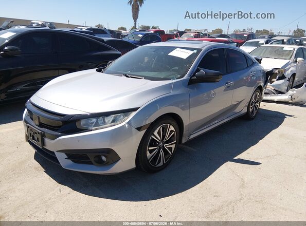 2HGFC1F39GH638148 2016 HONDA CIVIC Silver Առջևի ձախ երեք քառորդ տեսարան