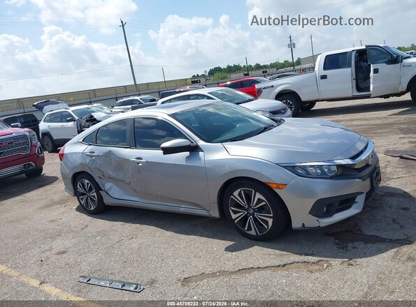 2HGFC1F70GH636792 2016 HONDA CIVIC Silver უკანა სალონის ხედი