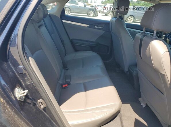 2HGFC1F70HH653089 2017 HONDA CIVIC Black Rear seats view