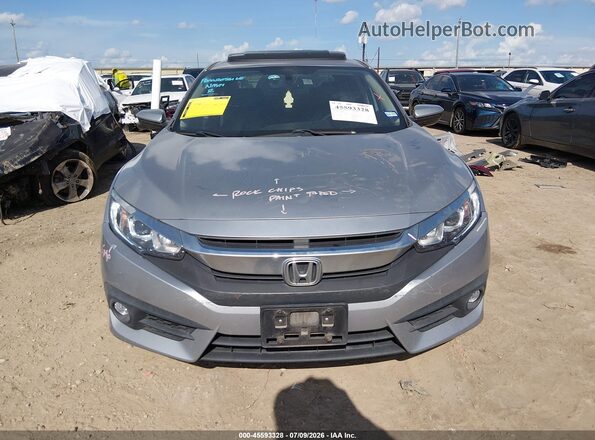 2HGFC1F73GH635359 2016 HONDA CIVIC Silver Rear interior view