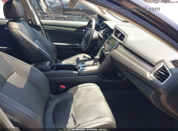 2HGFC1F76JH644886 2018 HONDA CIVIC Black Front interior view