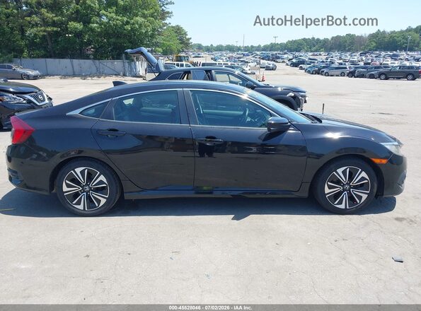 2HGFC1F76JH644886 2018 HONDA CIVIC Black Rear interior view