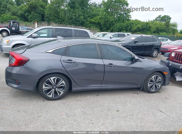 2HGFC1F7XHH657649 2017 HONDA CIVIC Gray Vista interior trasera