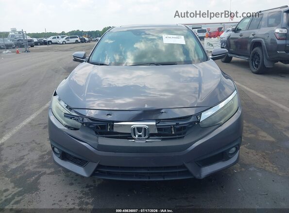 2HGFC1F90HH635242 2017 HONDA CIVIC Серый Вид щитка приборов