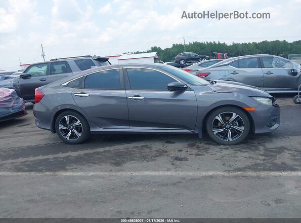 2HGFC1F90HH635242 2017 HONDA CIVIC Серый Вид задней части салона