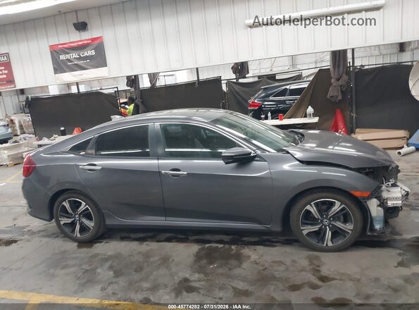 2HGFC1F95GH641584 2016 HONDA CIVIC Gray Vista interior trasera