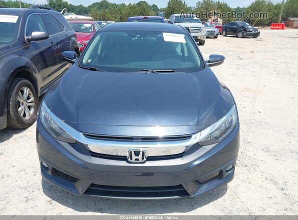 2HGFC1F95HH653820 2017 HONDA CIVIC Черный Вид щитка приборов