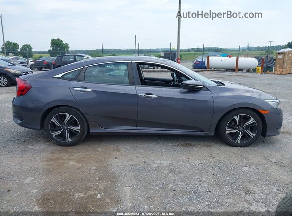 2HGFC1F95HH658709 2017 HONDA CIVIC Gray Widok wnętrza z tyłu
