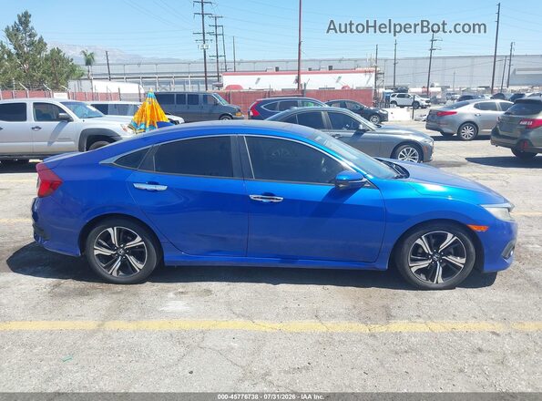 2HGFC1F96GH643246 2016 HONDA CIVIC Blue უკანა სალონის ხედი