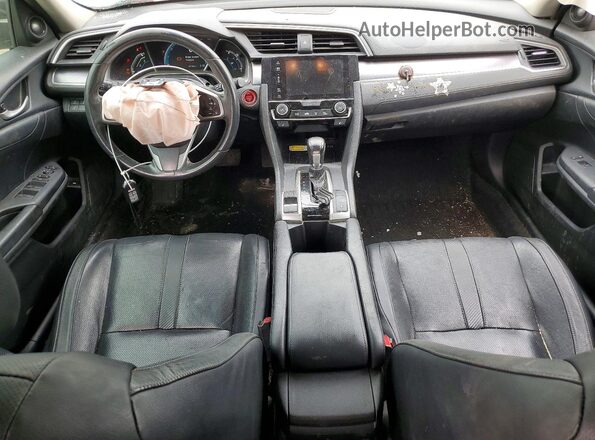 2HGFC1F99JH104434 2018 HONDA CIVIC Черный Вид панели приборов