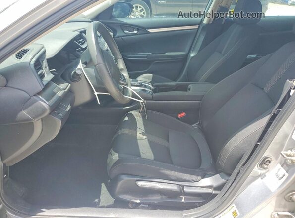 2HGFC2F50JH564567 2018 HONDA CIVIC Серебряный Вид салона спереди