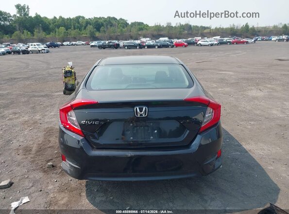 2HGFC2F50JH565573 2018 HONDA CIVIC Black 