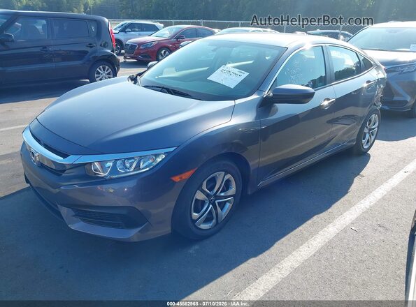 2HGFC2F51JH594127 2018 HONDA CIVIC Gray Vista tres cuartos delantera izquierda