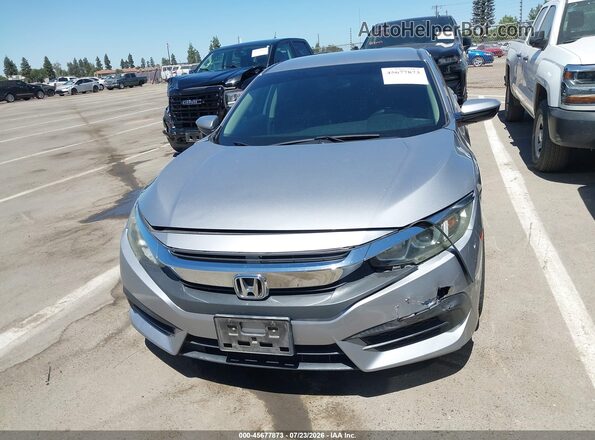 2HGFC2F54GH530365 2016 HONDA CIVIC Silver Սալոնի հետևի տեսք