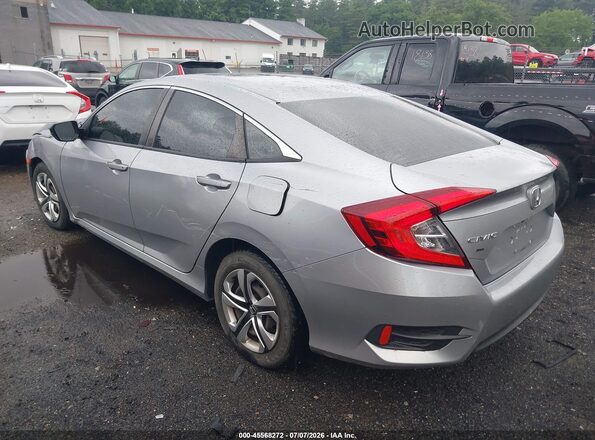 2HGFC2F54JH519602 2018 HONDA CIVIC Silver Trasero izquierdo