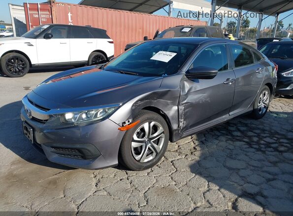 2HGFC2F55GH549913 2016 HONDA CIVIC Gray Vista tres cuartos delantera izquierda