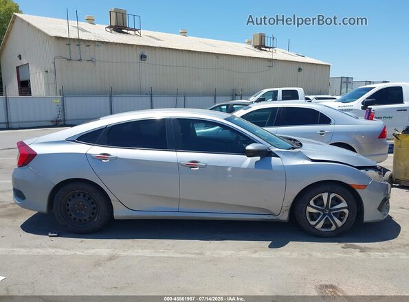 2HGFC2F55HH548973 2017 HONDA CIVIC Серебряный Вид задней части салона