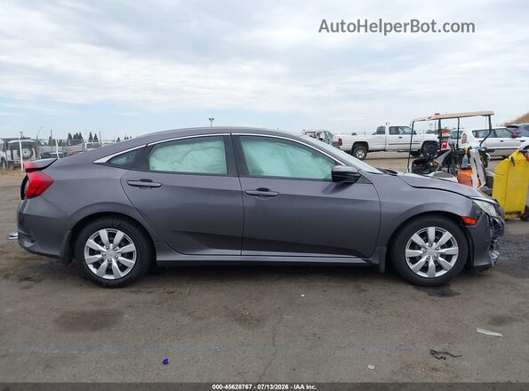 2HGFC2F57HH564334 2017 HONDA CIVIC Серый Вид задней части салона