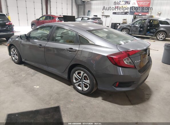 2HGFC2F57JH504348 2018 HONDA CIVIC Black Trasero izquierdo