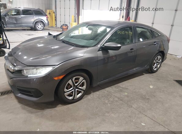 2HGFC2F57JH504348 2018 HONDA CIVIC Black Vista tres cuartos delantera izquierda