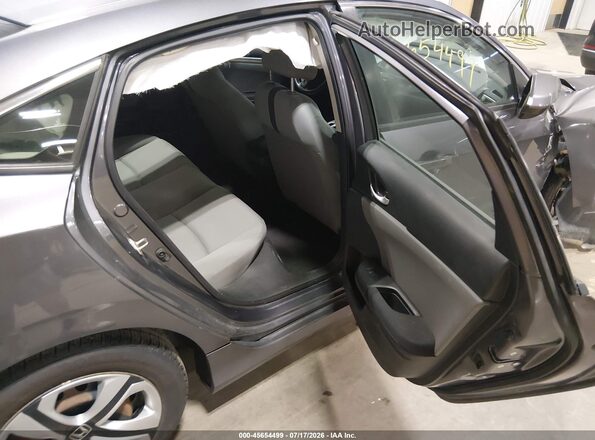 2HGFC2F57JH504348 2018 HONDA CIVIC Black Vista de la etiqueta del VIN