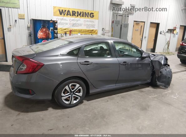 2HGFC2F57JH504348 2018 HONDA CIVIC Black Trasero derecho