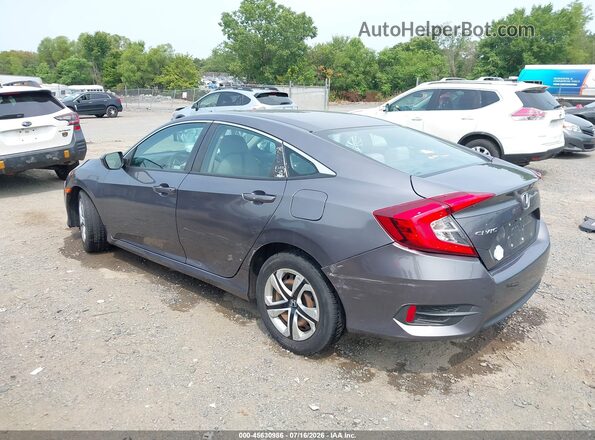 2HGFC2F57JH571287 2018 HONDA CIVIC Gray Trasero izquierdo