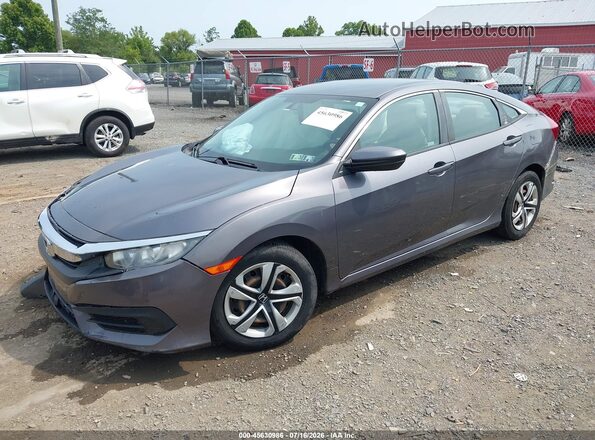 2HGFC2F57JH571287 2018 HONDA CIVIC Gray Vista tres cuartos delantera izquierda