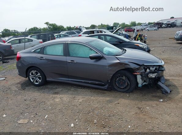 2HGFC2F57JH571287 2018 HONDA CIVIC Gray Vista interior trasera