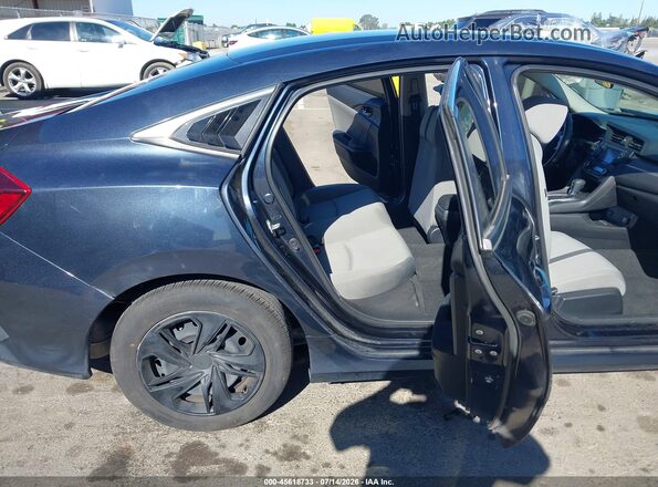 2HGFC2F57JH573041 2018 HONDA CIVIC Blue Вид наклейки з VIN-кодом