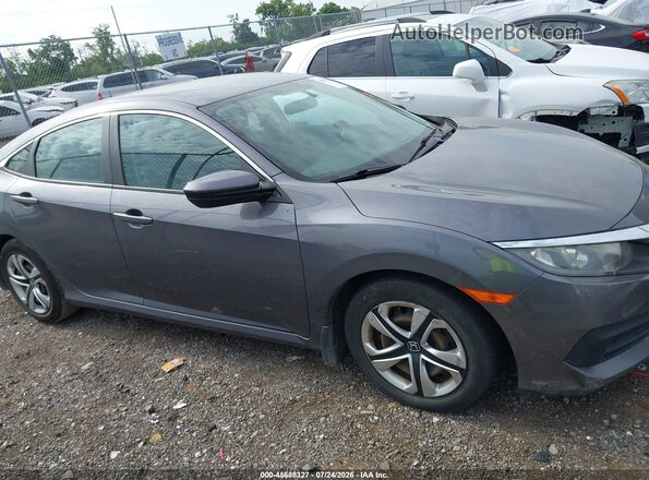 2HGFC2F57JH574075 2018 HONDA CIVIC Gray Rear interior view