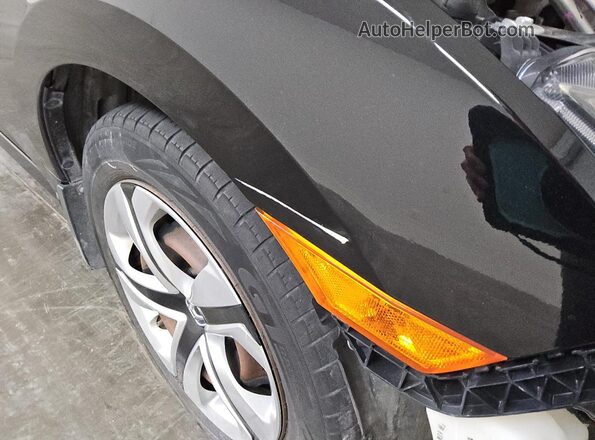 2HGFC2F57JH583584 2018 HONDA CIVIC Black 