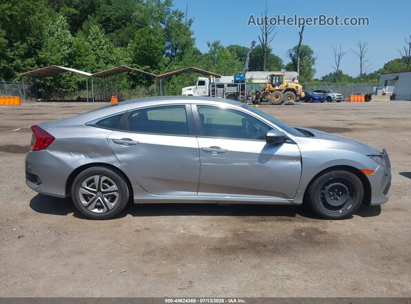2HGFC2F58GH521264 2016 HONDA CIVIC Серебряный Вид задней части салона