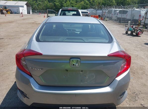 2HGFC2F58GH521264 2016 HONDA CIVIC Серебряный 