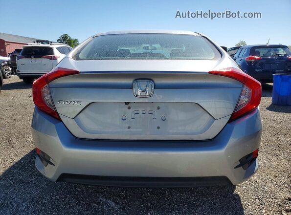 2HGFC2F58HH004581 2017 HONDA CIVIC Silver Widok z tyłu