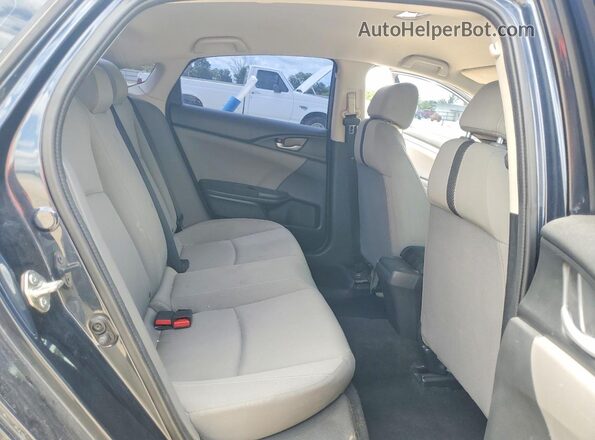 2HGFC2F58JH590334 2018 HONDA CIVIC Black Rear seats view