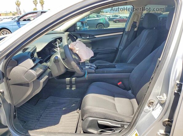 2HGFC2F59JH582565 2018 HONDA CIVIC Silver Vista interior delantera