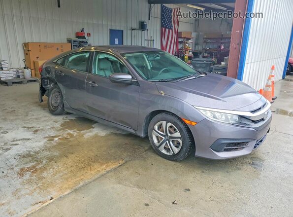 2HGFC2F5XJH553396 2018 HONDA CIVIC Charcoal Front right