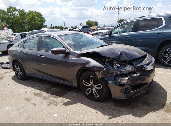 2HGFC2F5XJH594563 2018 HONDA CIVIC Gray უკანა სალონის ხედი