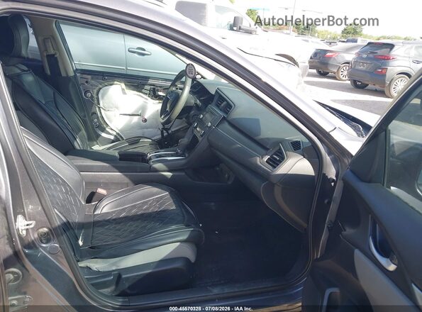 2HGFC2F64JH544847 2018 HONDA CIVIC Серый Вид салона спереди