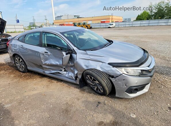 2HGFC2F67JH043242 2018 HONDA CIVIC Silver Delantero derecho