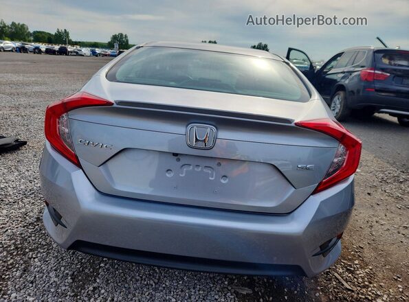 2HGFC2F67JH043242 2018 HONDA CIVIC Silver Vista trasera