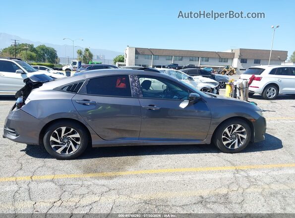 2HGFC2F71HH515440 2017 HONDA CIVIC Gray Rear interior view