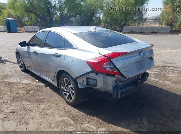 2HGFC2F71JH549559 2018 HONDA CIVIC Silver Trasero izquierdo