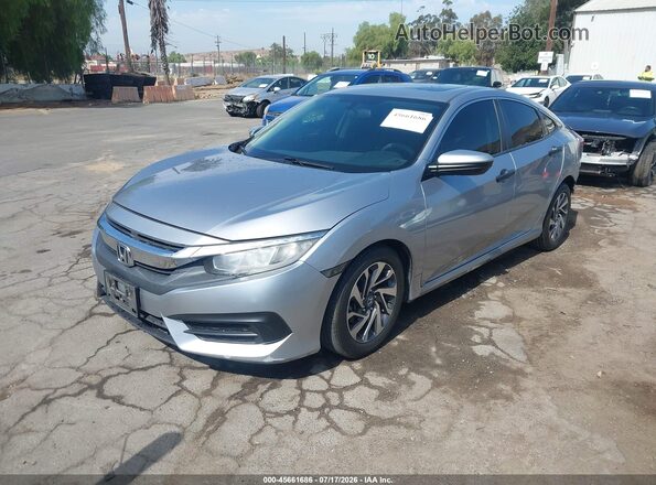 2HGFC2F71JH549559 2018 HONDA CIVIC Silver Vista tres cuartos delantera izquierda