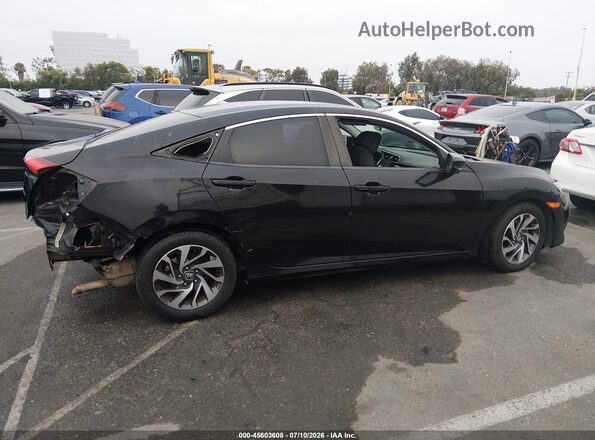 2HGFC2F74GH560709 2016 HONDA CIVIC Black Rear interior view