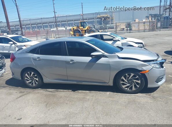 2HGFC2F74HH503928 2017 HONDA CIVIC Silver Rear interior view