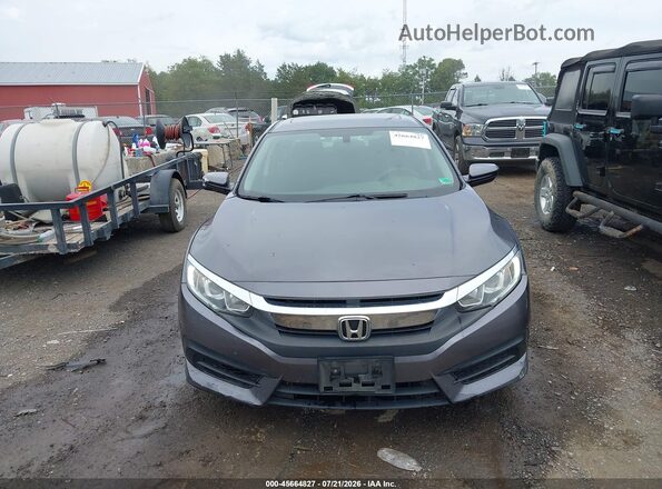 2HGFC2F75HH551499 2017 HONDA CIVIC Gray Вид спереду